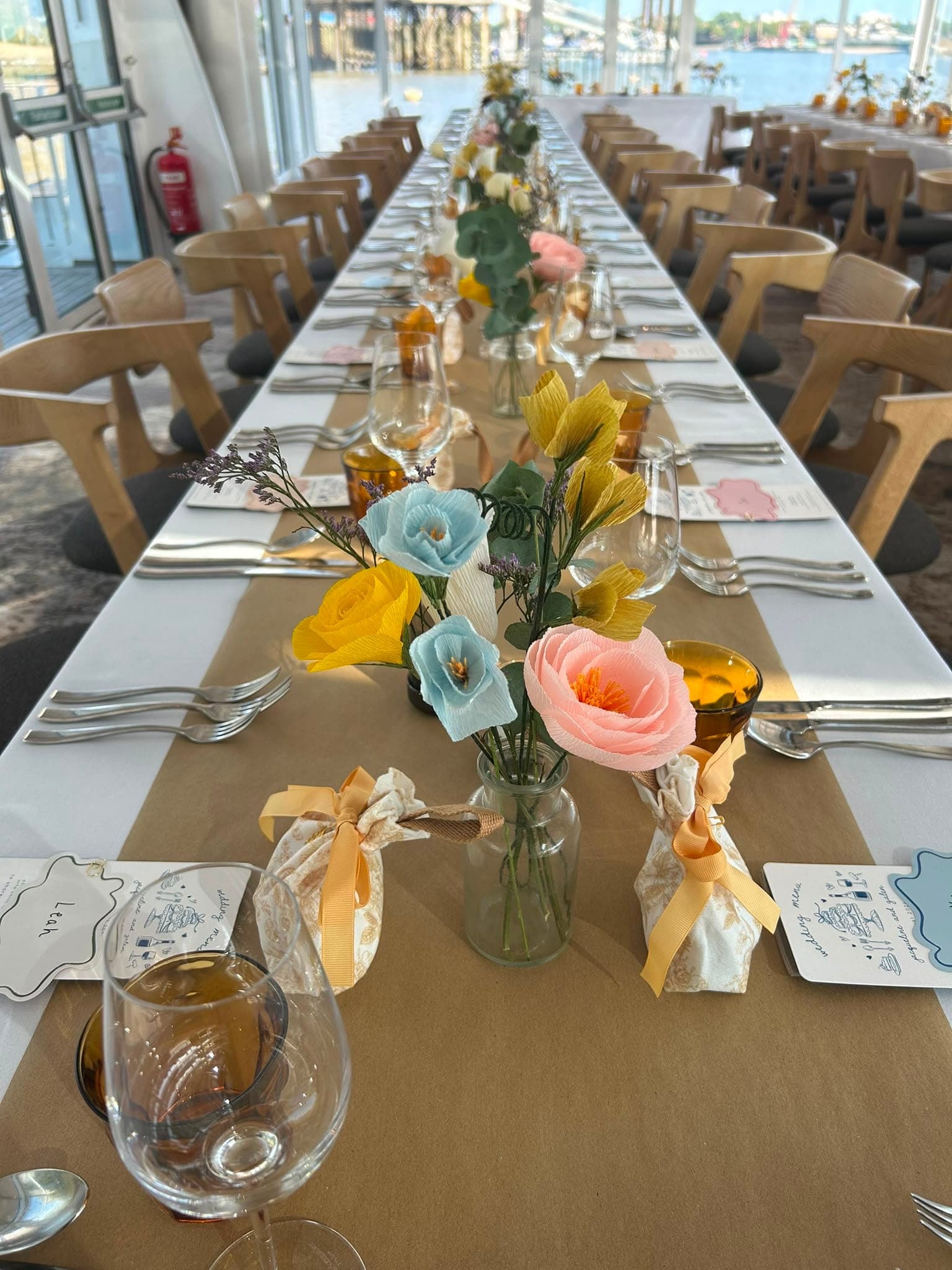 Long banquet table run with seasonal flowers